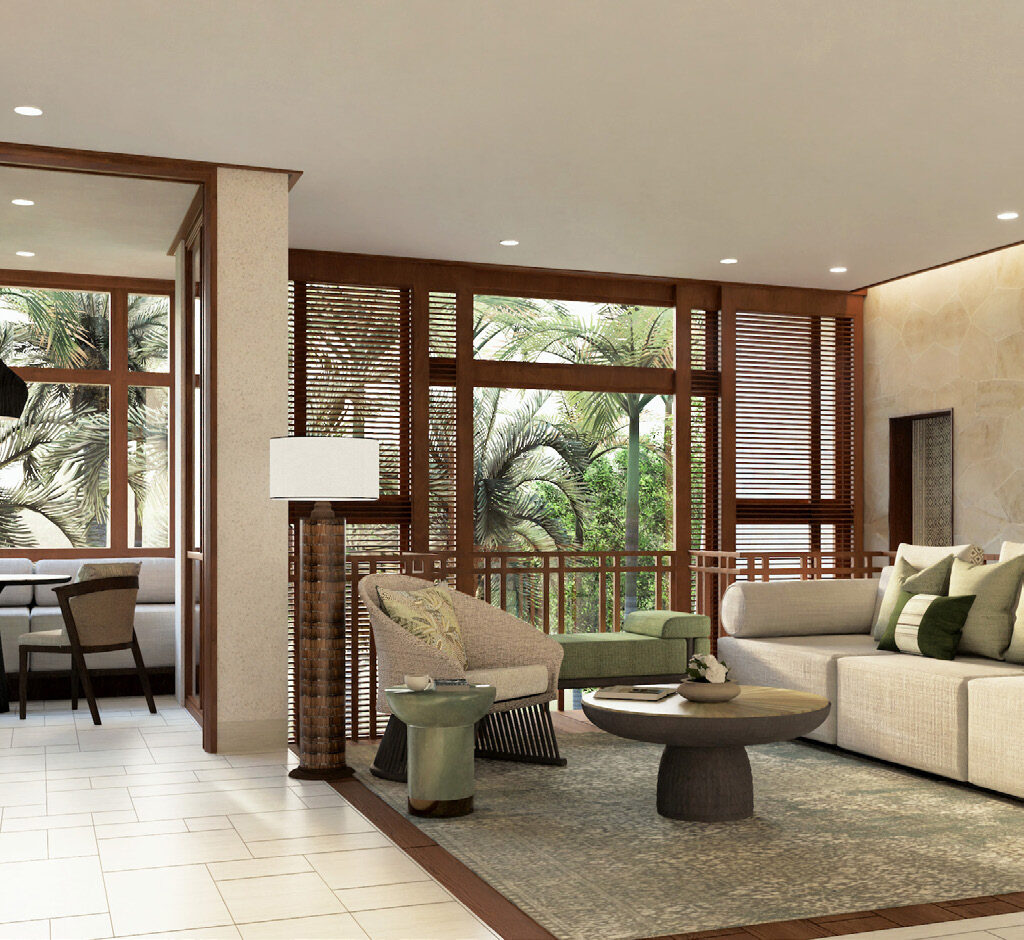 A spacious suite interior at Four Seasons Resort Bali with lush tropical garden views and warm wood tones