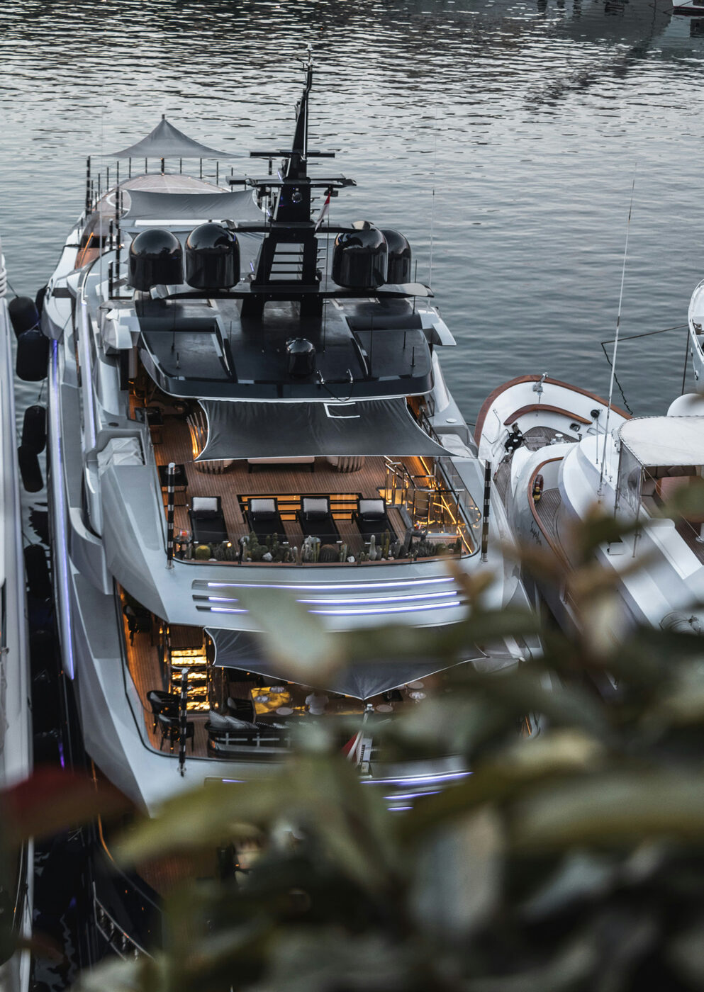Superyacht moored at a marina at dusk
