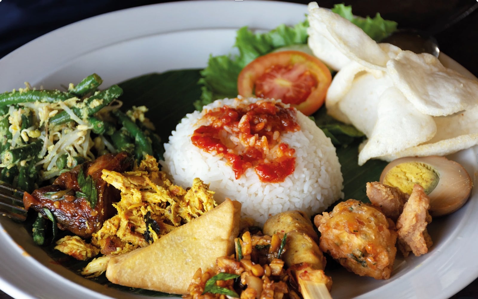 If you come to Bali, you have to try “Nasi Campur”